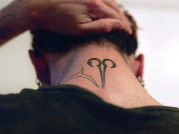Zodiac Aries Symbol Tattoo On Back Neck