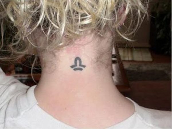 Tiny Libra Tattoo On Neck Back