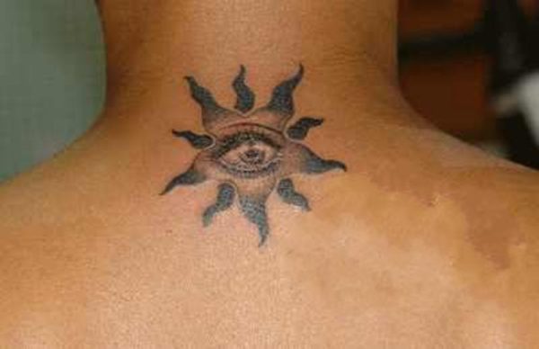 Tribal Eye Sun Tattoo On Neck